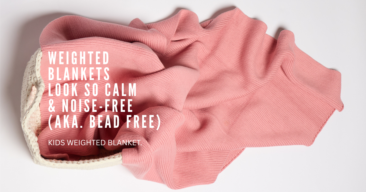 Pink kids weighted blanket with text on a white background. 
