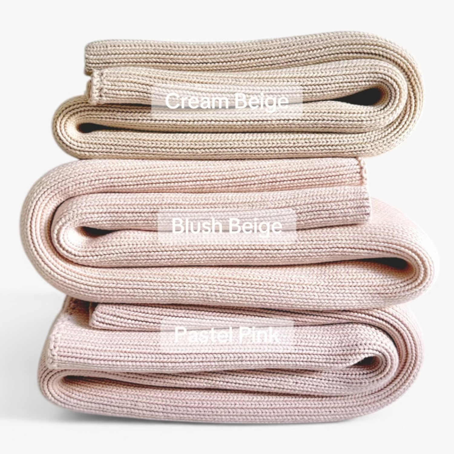 Three folded children weighted blanket labeled 'Cream Beige', 'Blush Beige', and 'Pastel Pink' on a white background.